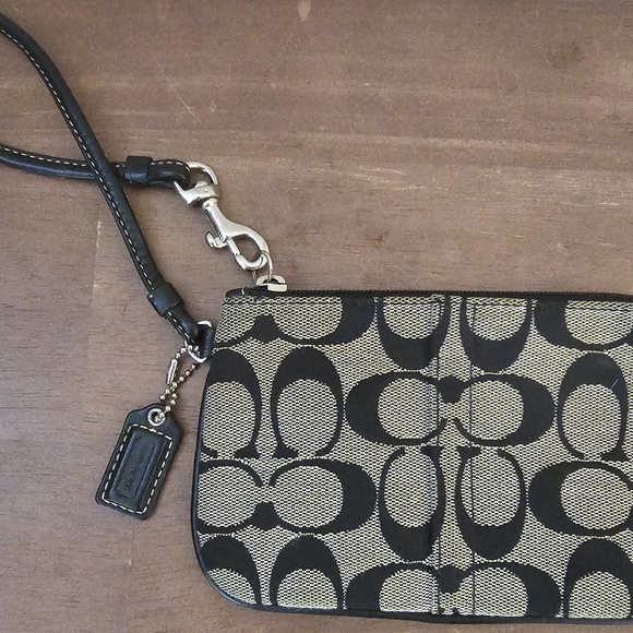 Coach Handbags - Coach Black and Tan Wristlet